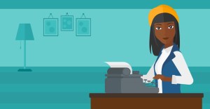 Reporter working at typewriter.